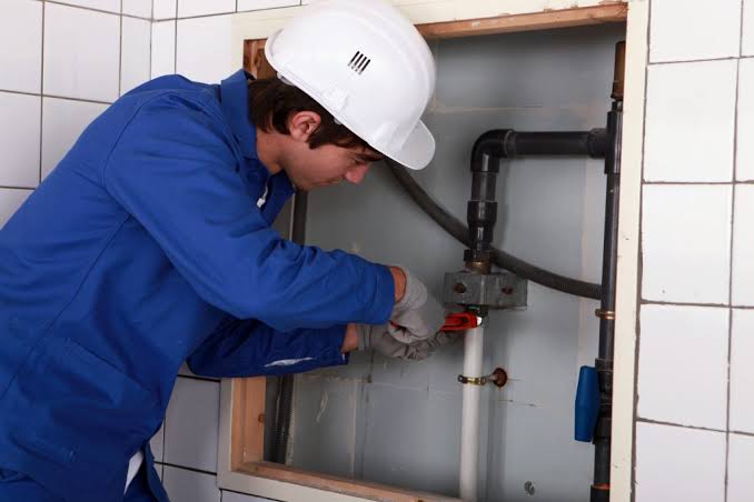 Technician performing Commercial & Rental Properties